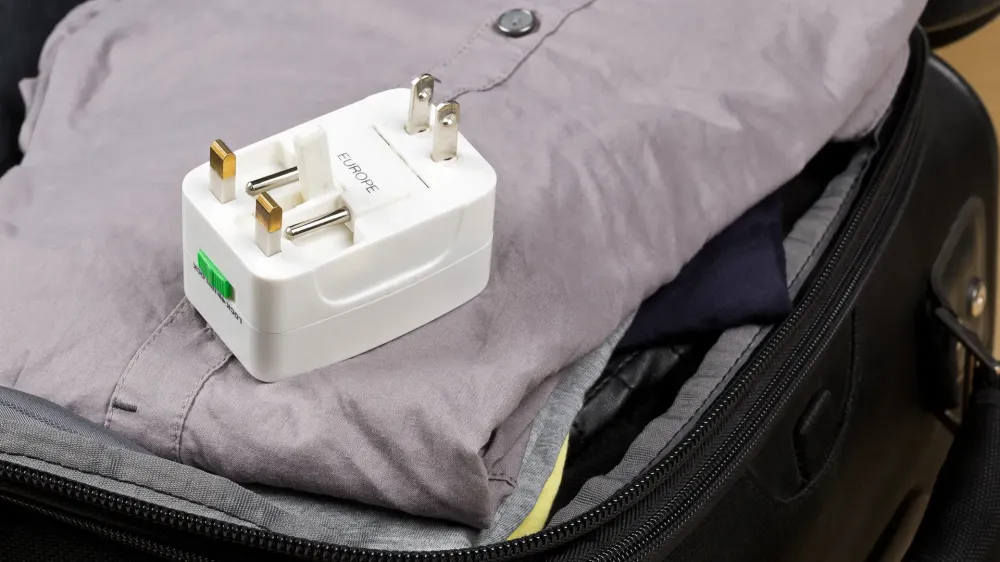 travel adapter in suitcase.
